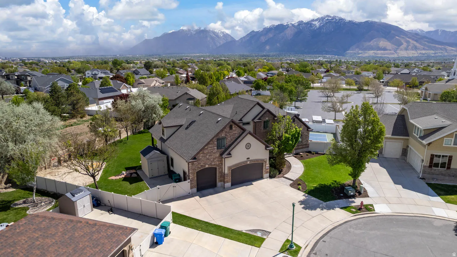 Aerial view of residential area featuring mountains