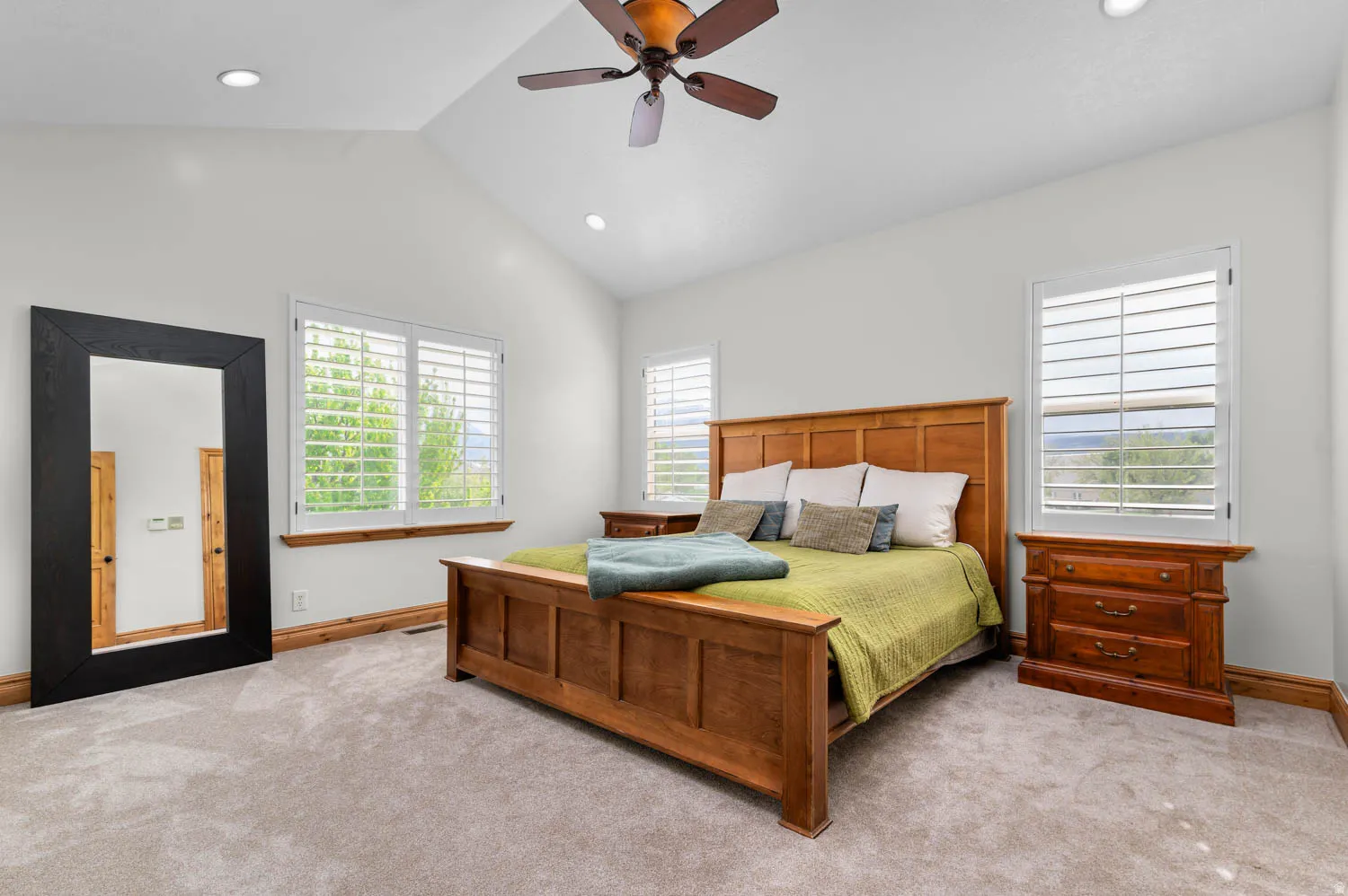 Bedroom featuring carpet flooring, a ceiling fan, and recessed lighting