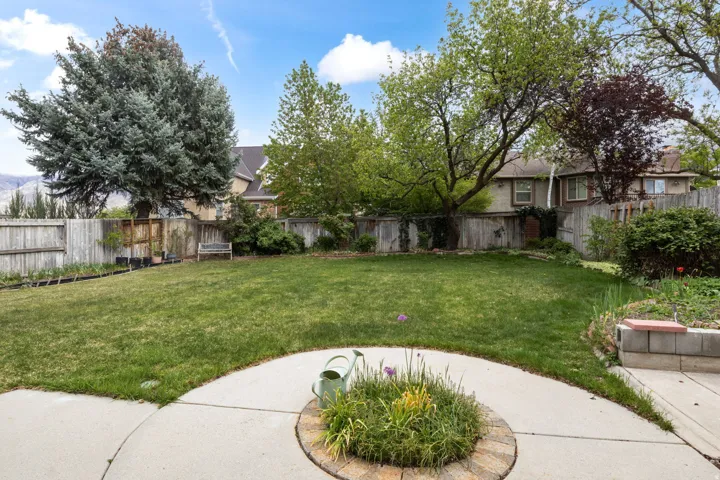 View of fenced backyard