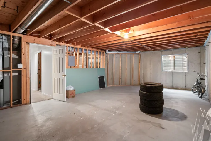 Basement featuring electric panel