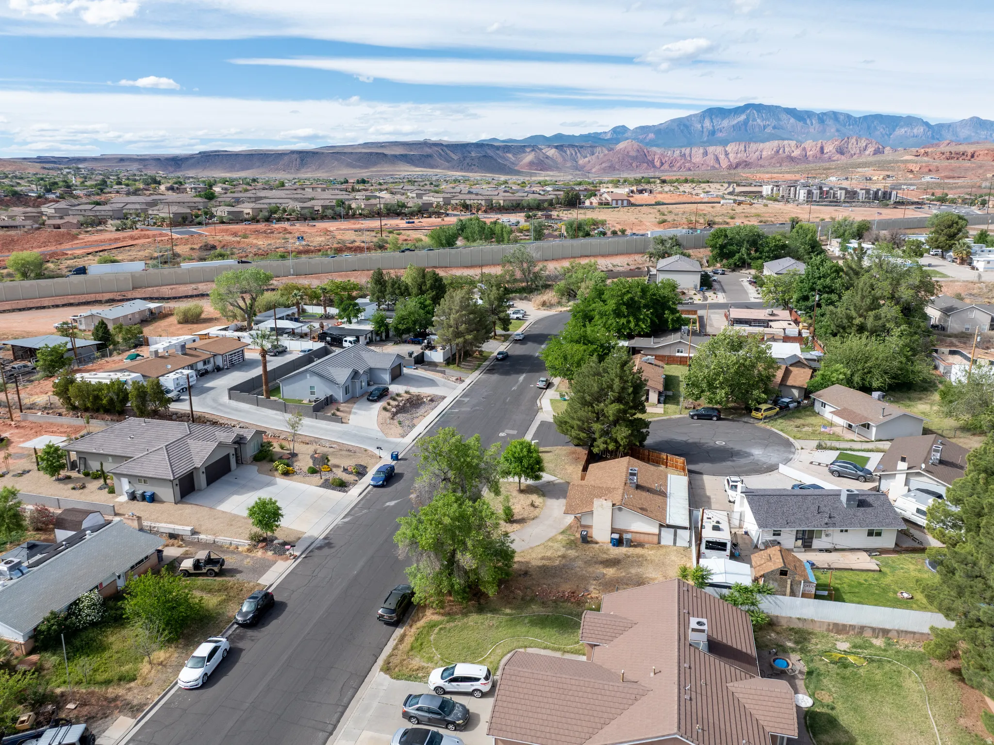 Aerial perspective of suburban area featuring mountains