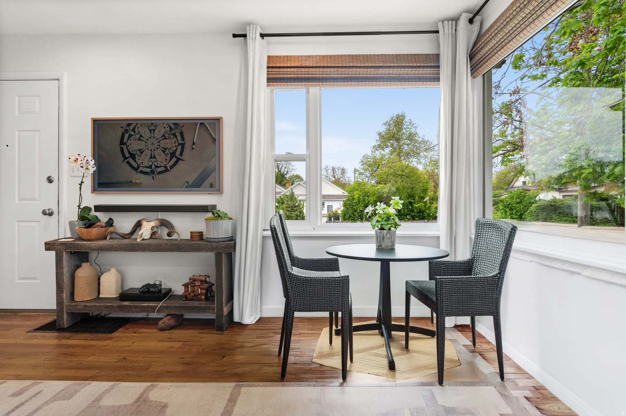 AI Generated rework of living room to feature additional dining area.