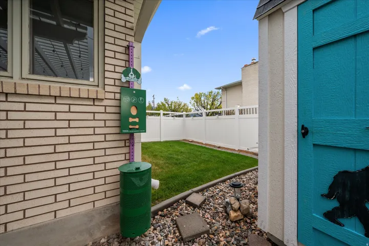 View of fenced backyard