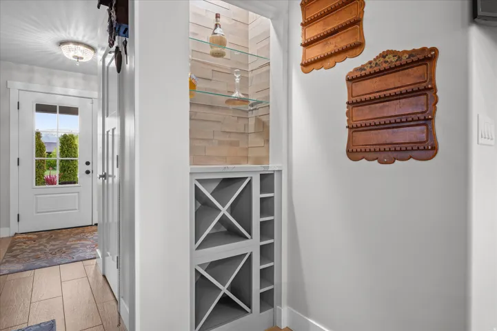 Doorway featuring wood finished floors