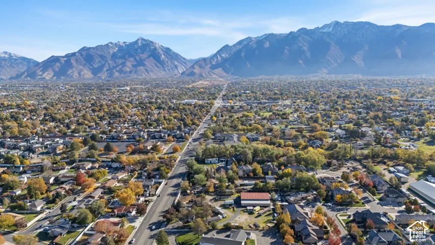 Aerial view of residential area with a mountainous background