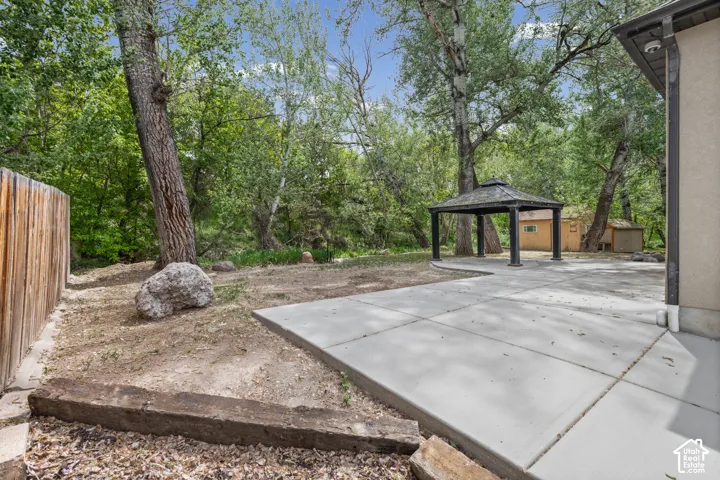 View of patio featuring a gazebo