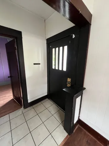 Foyer with baseboards