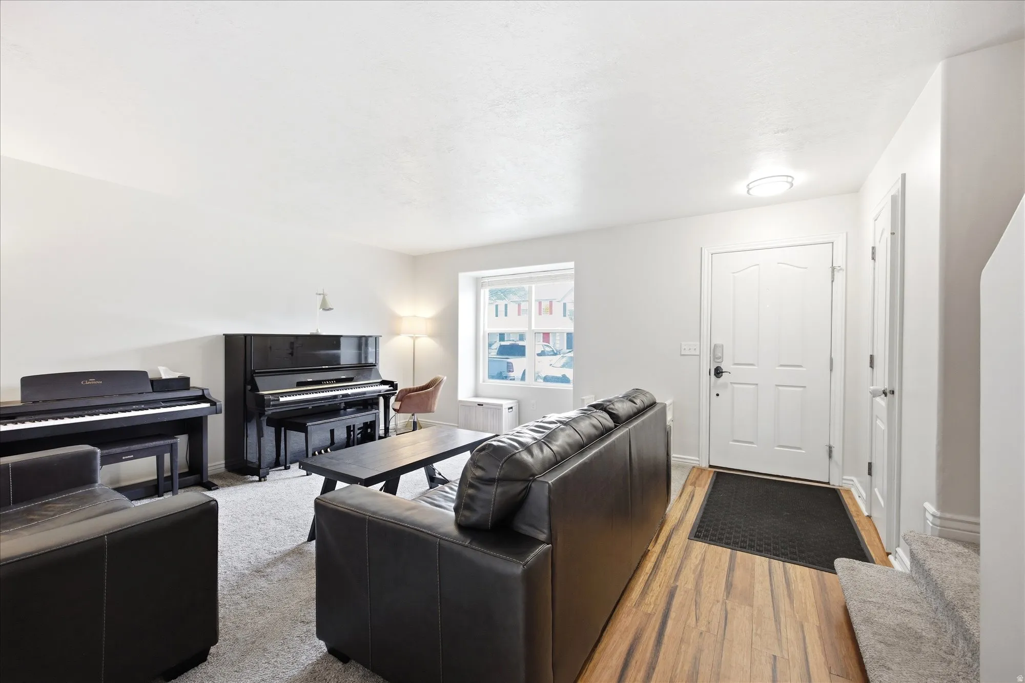 Living area featuring wood finished floors and baseboards
