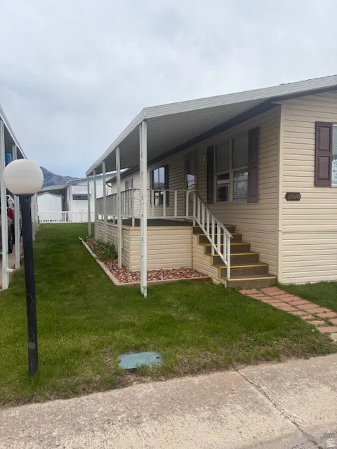 View of front of house with stairs