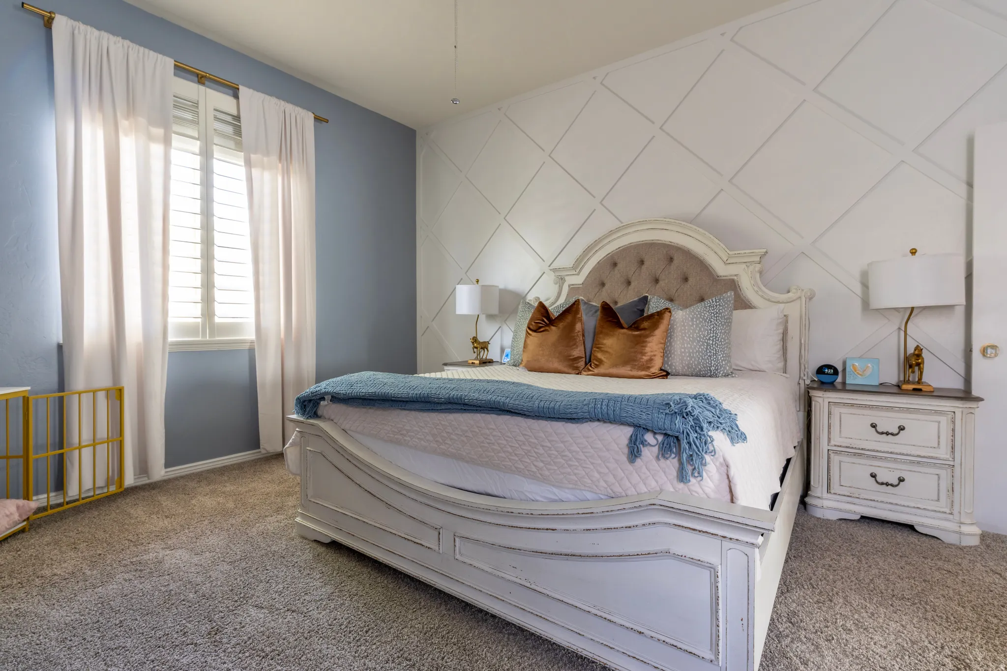 Carpeted bedroom featuring baseboards