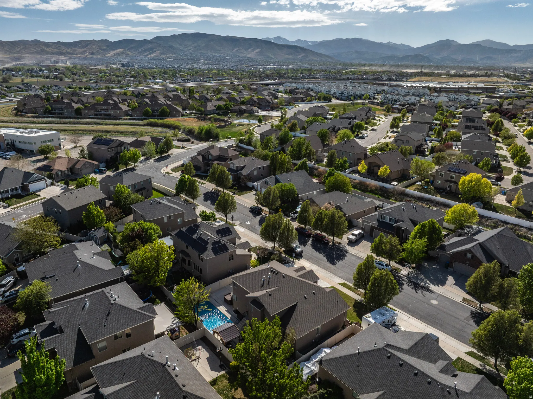 Aerial view of residential area with a mountain backdrop