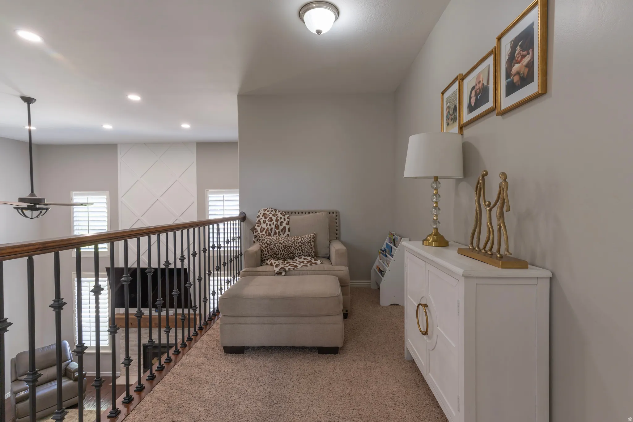 Sitting room featuring light colored carpet and recessed lighting