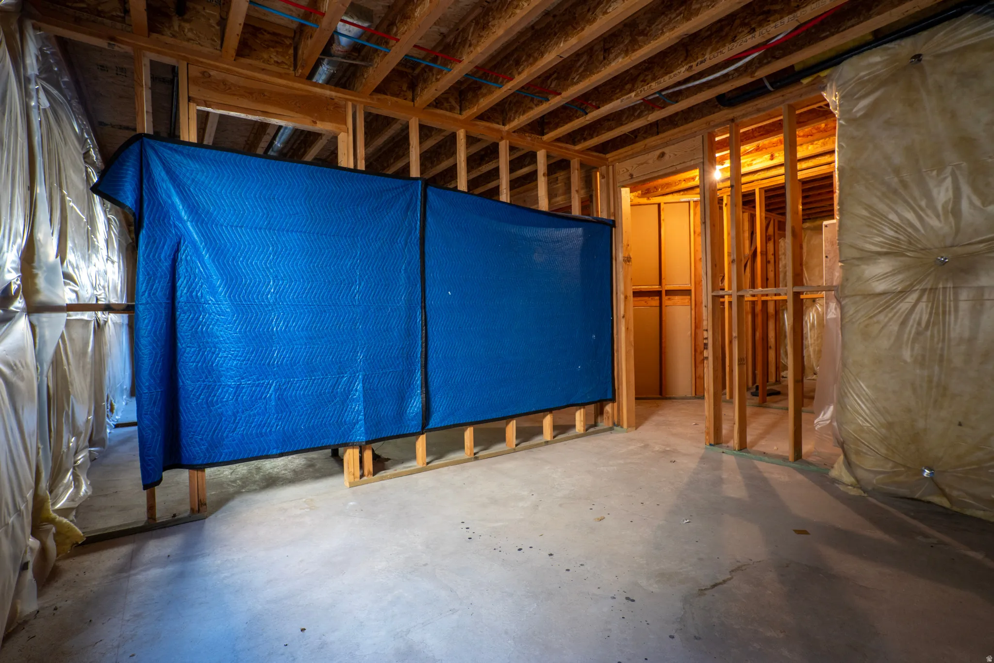 Misc room featuring concrete flooring