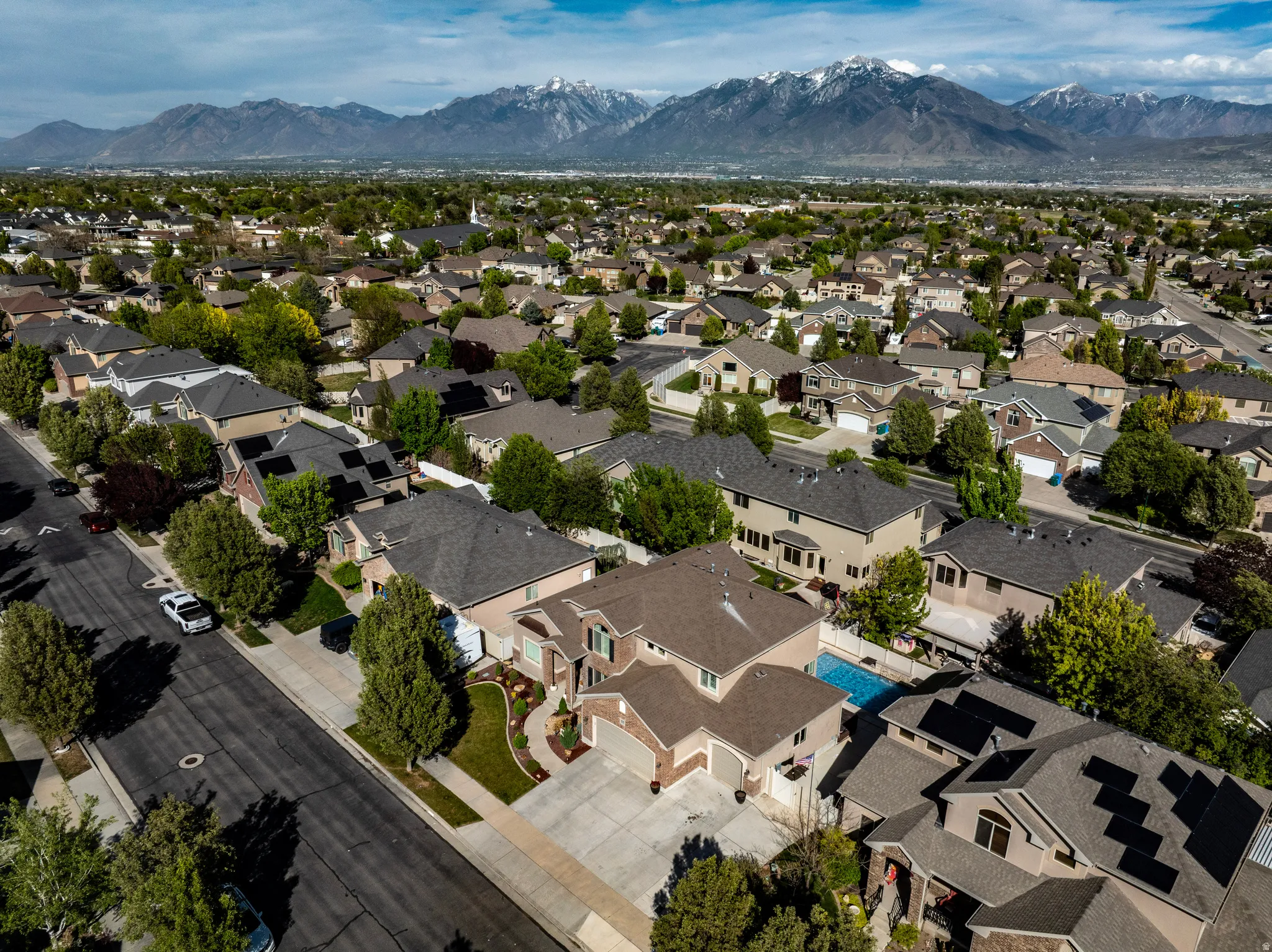 Aerial perspective of suburban area featuring mountains
