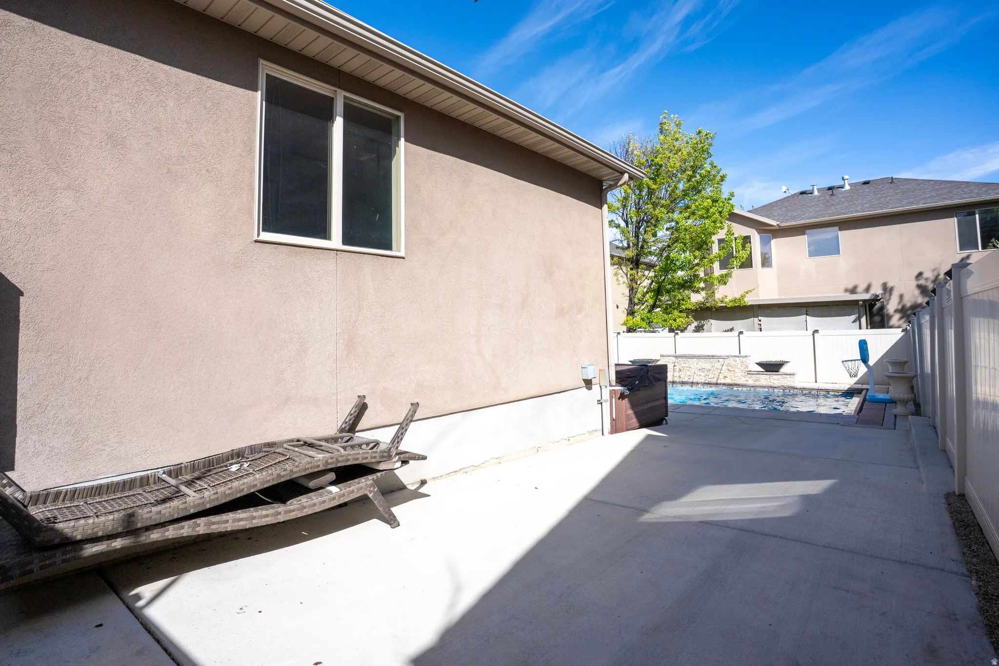 View of fenced backyard