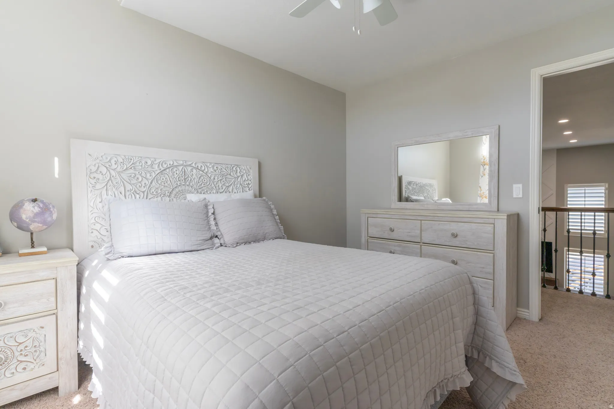 Bedroom featuring carpet floors, a ceiling fan, and recessed lighting