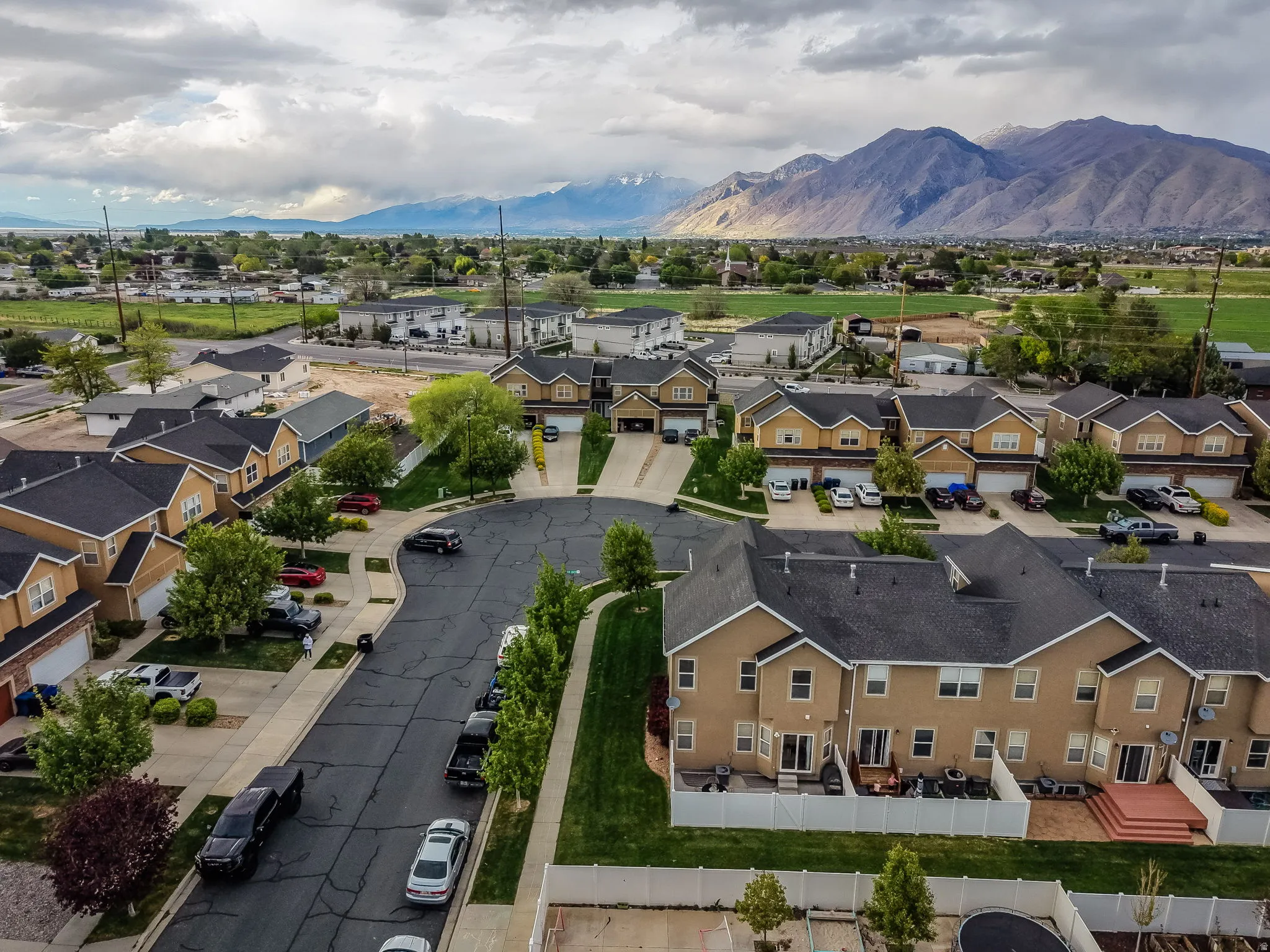 Aerial view of residential area with a mountainous background