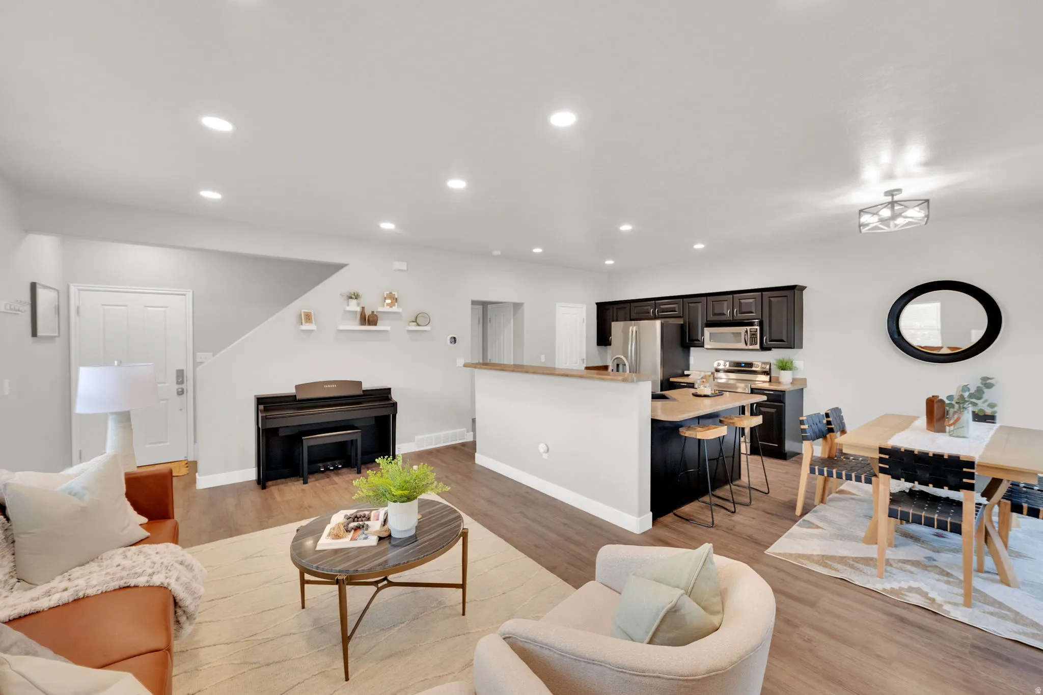 Living room featuring recessed lighting and light wood finished floors
