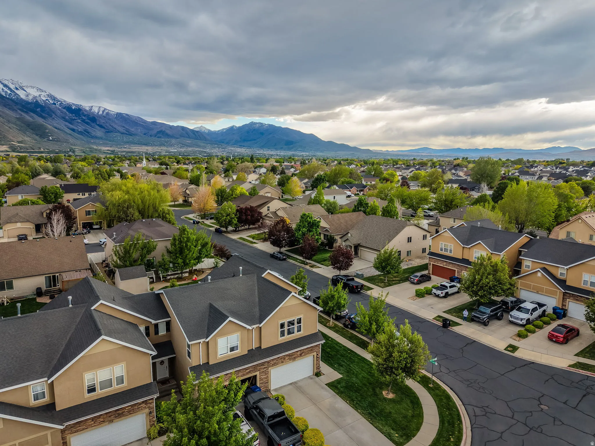 Aerial view of residential area with a mountain backdrop