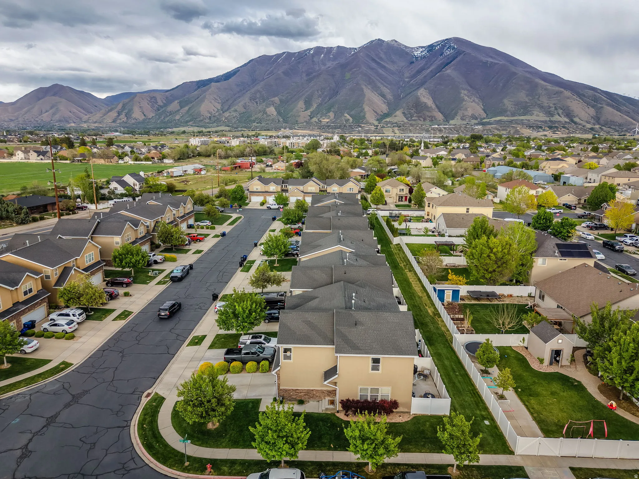 Aerial view of residential area with a mountain backdrop