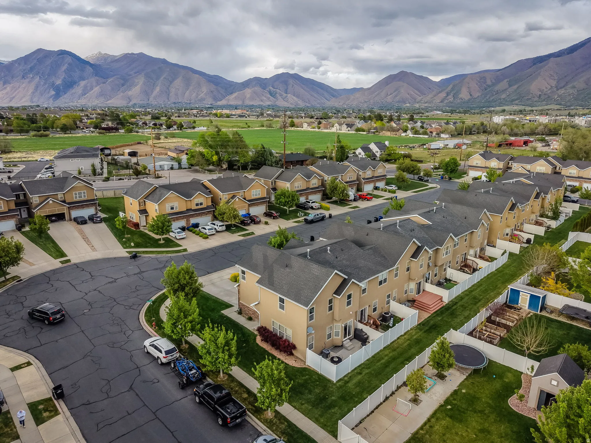 Aerial view of residential area with a mountainous background