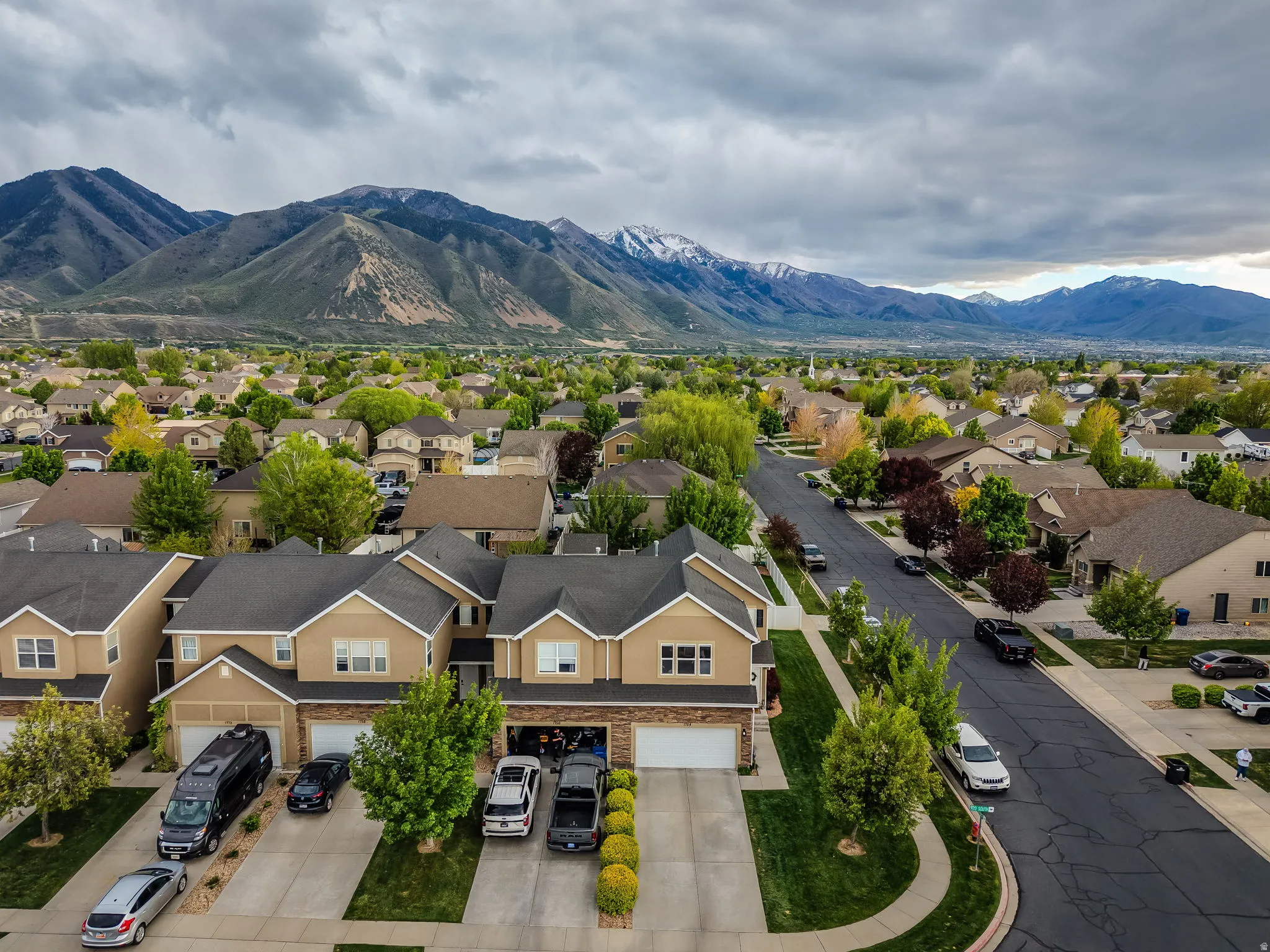 Aerial perspective of suburban area featuring mountains