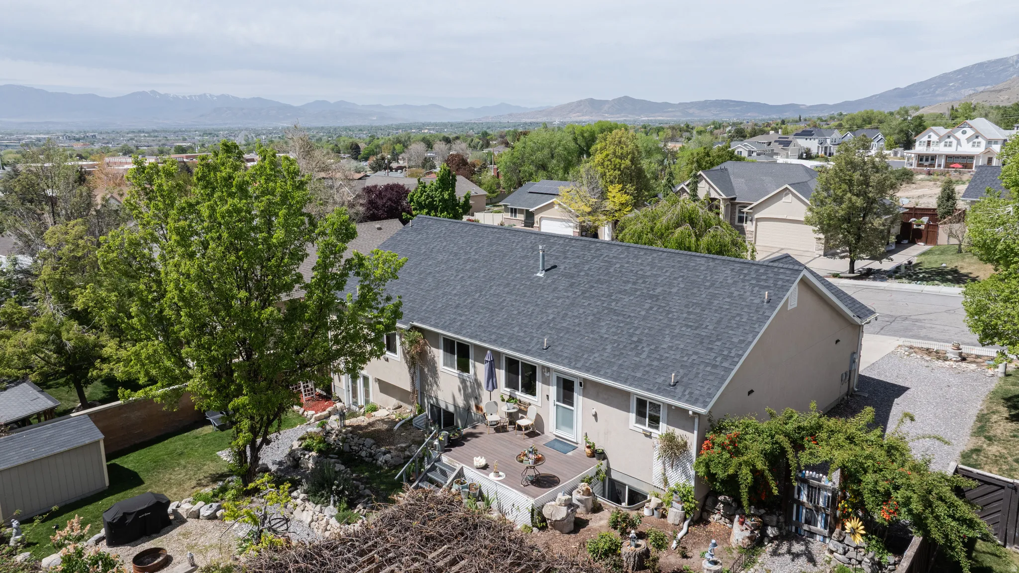 Aerial view of residential area featuring mountains