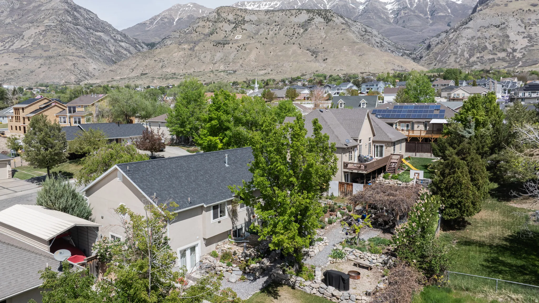 Aerial perspective of suburban area with mountains