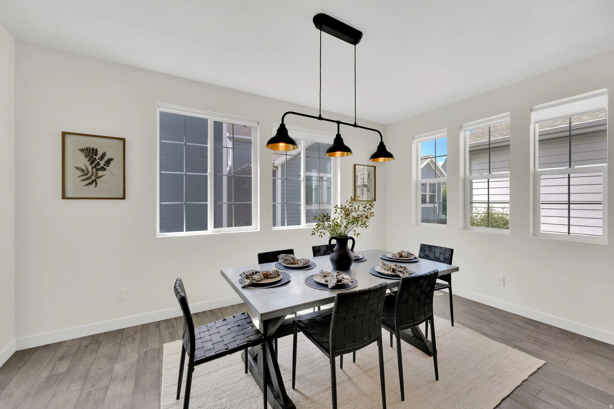 Dining space featuring wood finished floors