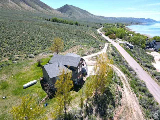 Aerial view of sparsely populated area featuring a mountain backdrop