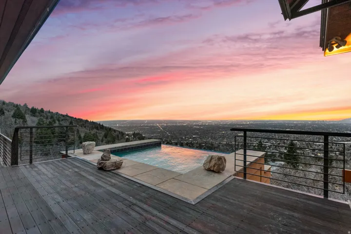 Back deck at dusk with a 9'x13' infinity hot tub