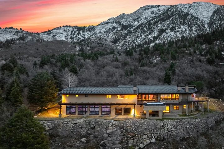 Back of property with a mountain view