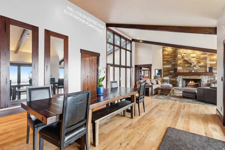 Dining area featuring wall edited white for visual purposes