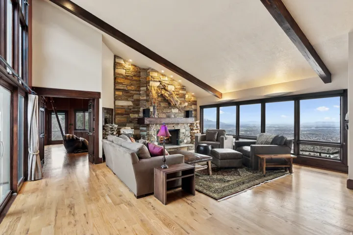 Living room with grand entrance to primary master bedroom on left.
