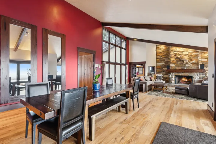 Dining area featuring 10' mirrors, & solid 3/4" tongue & groove cherry wood paneling