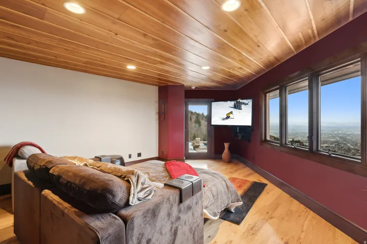 5th bedroom showing door to patio and hot tub.