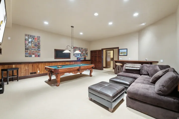 Game room featuring light carpet, wainscoting, wooden walls, billiards, and recessed lighting