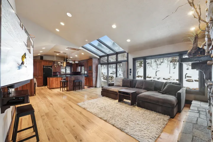 Family room with kitchen in background.