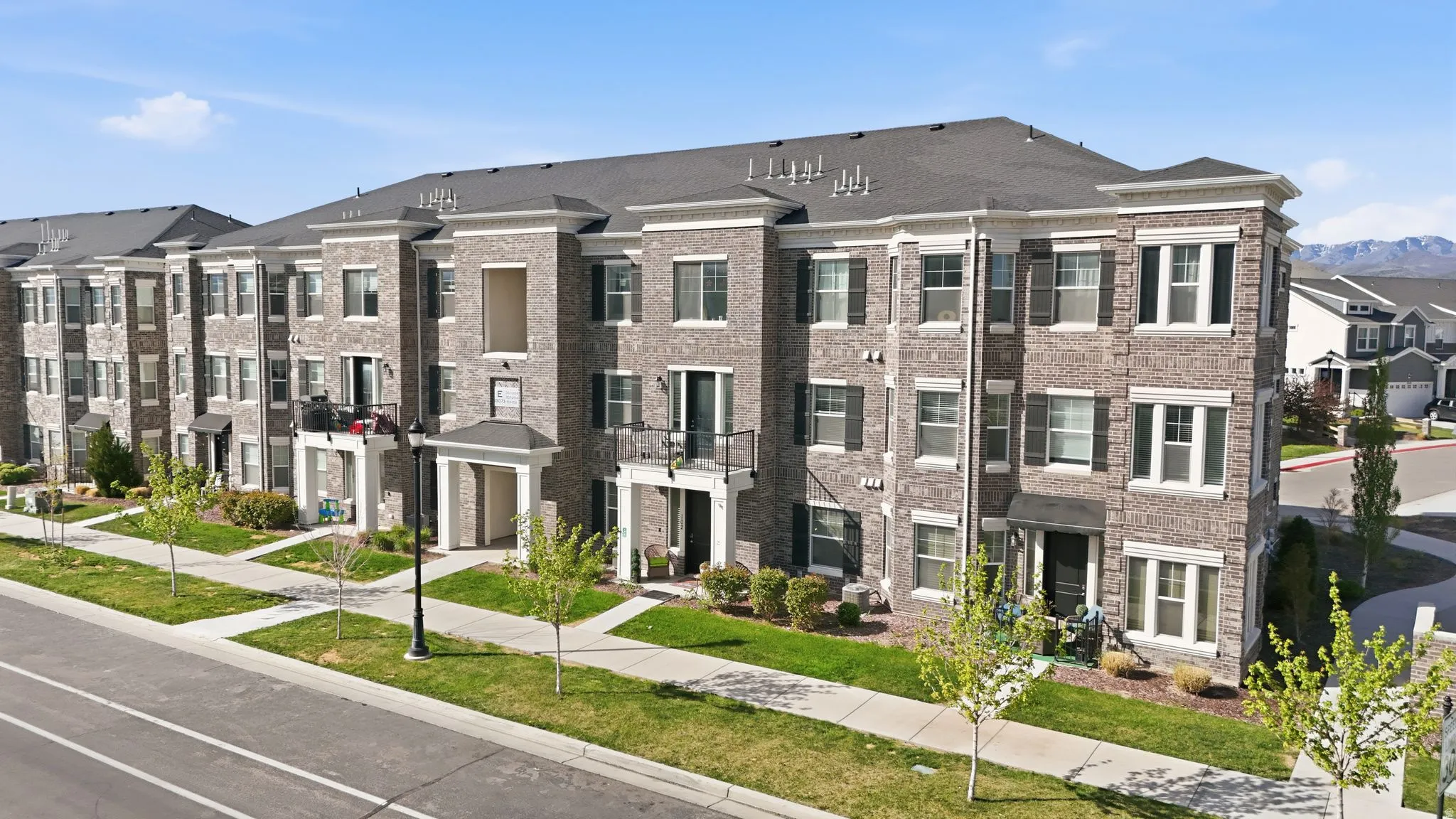 View of property with a residential view