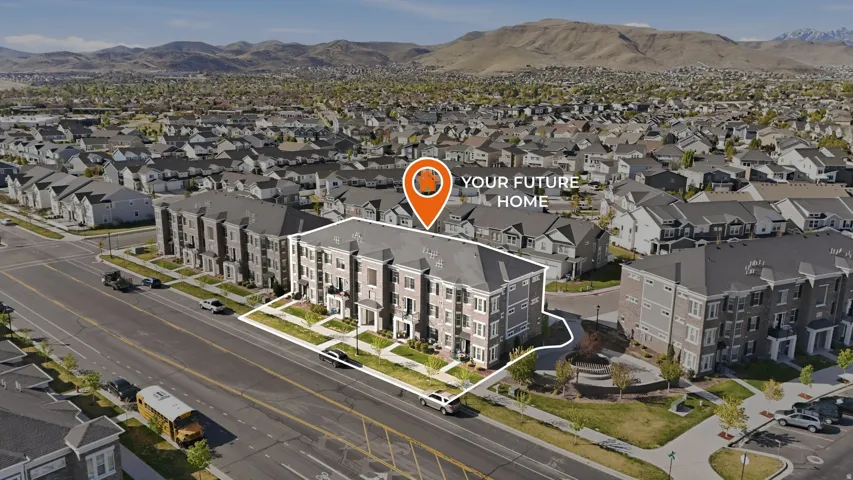 Aerial view of residential area with a mountainous background