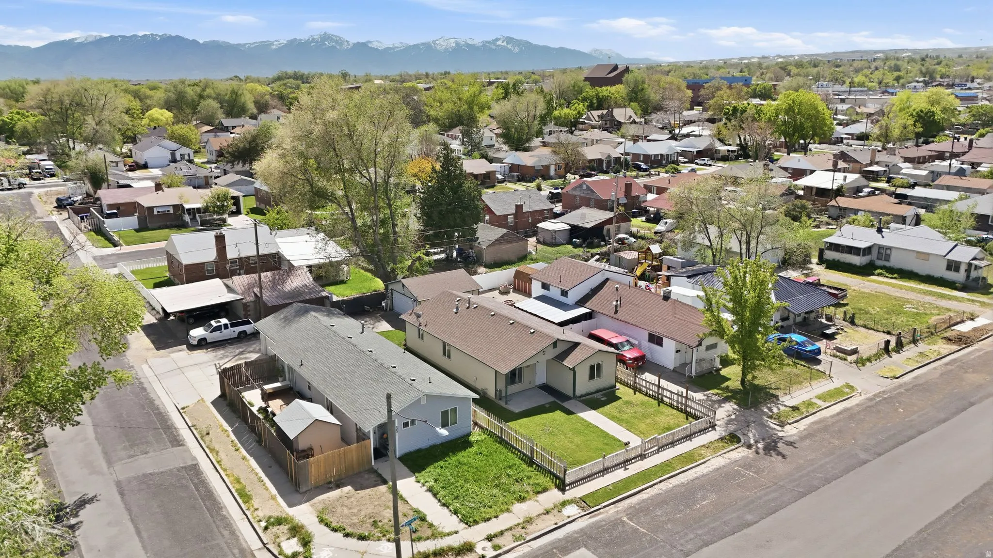 Aerial view of residential area with mountains