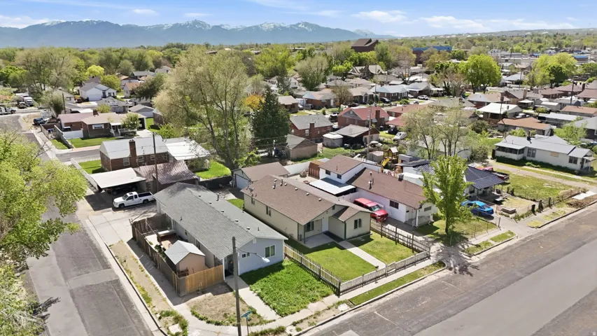 Aerial view of residential area with mountains