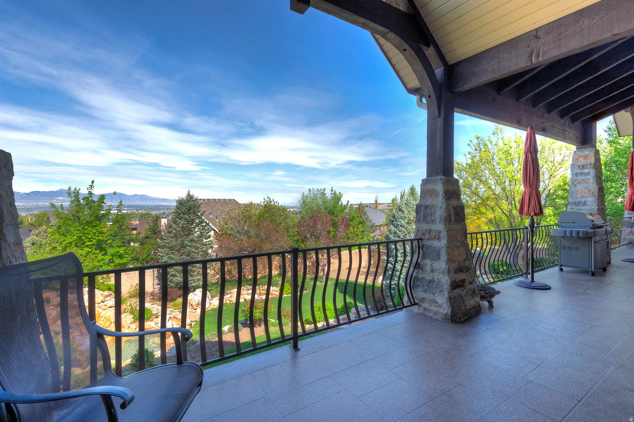 Balcony with grilling area and a mountain view