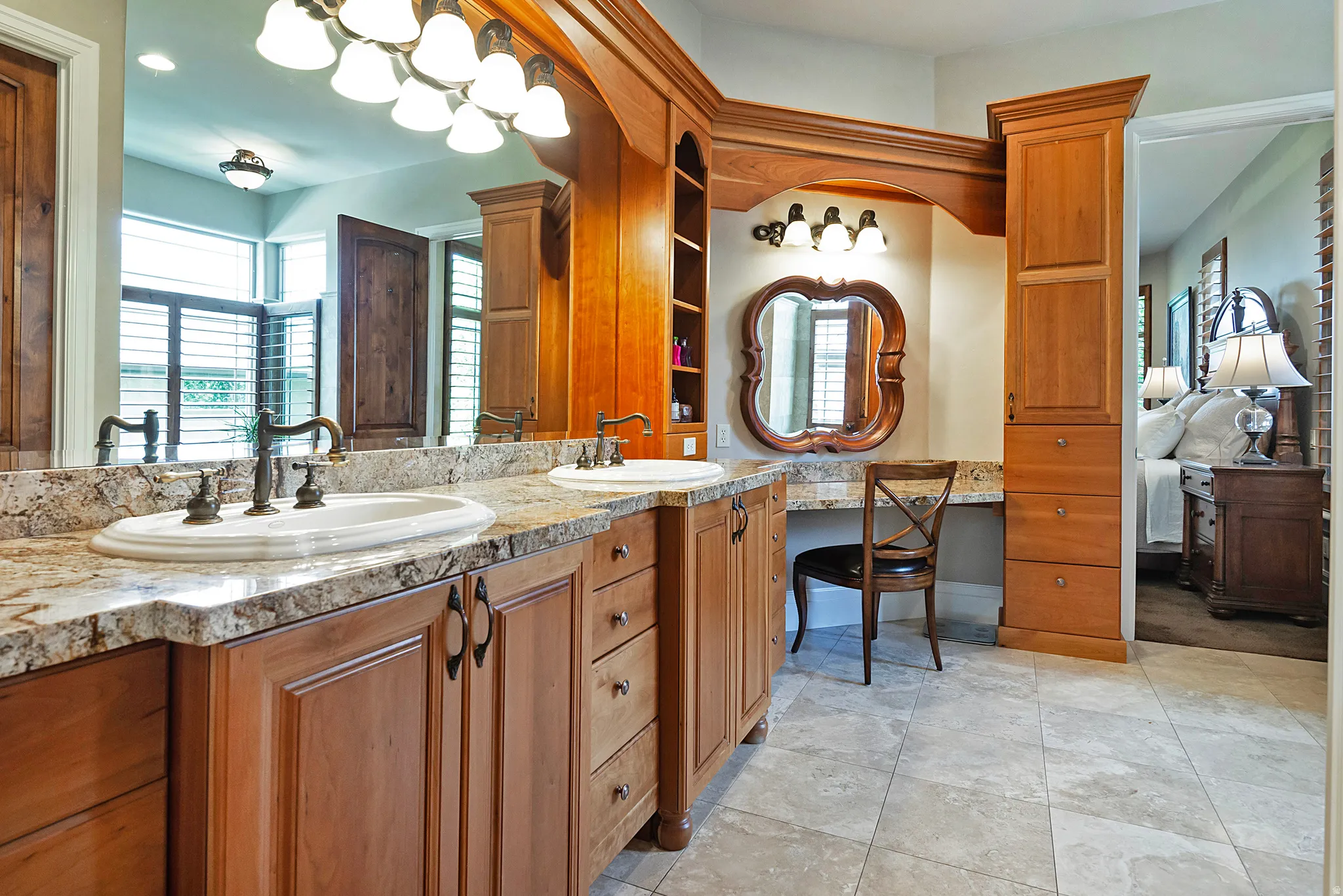Ensuite bathroom featuring double vanity