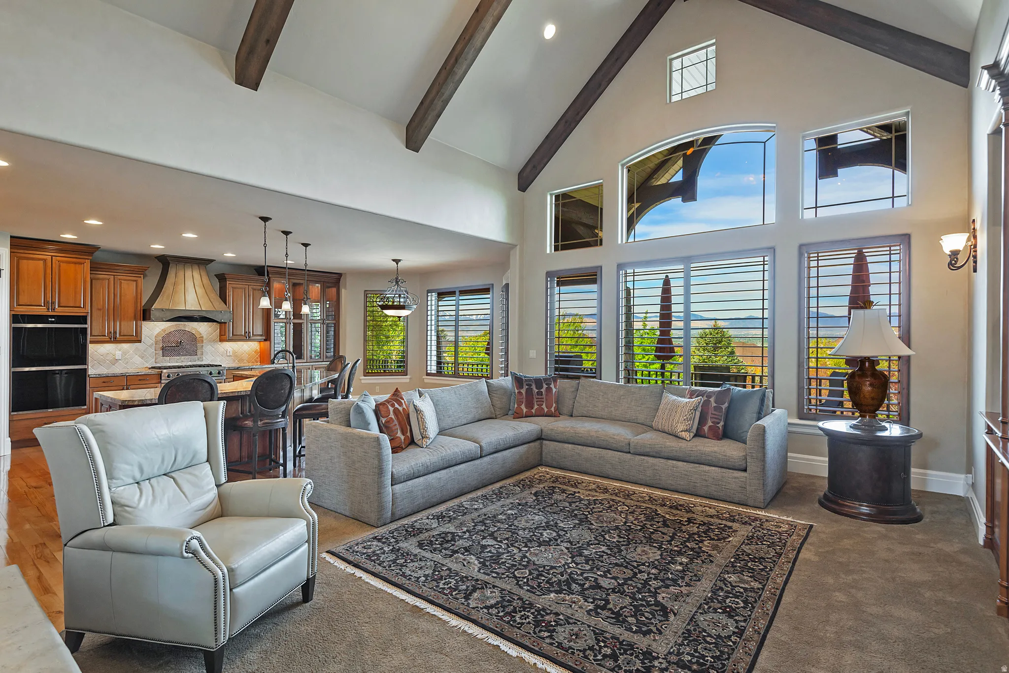 Living room featuring recessed lighting and lofted ceiling