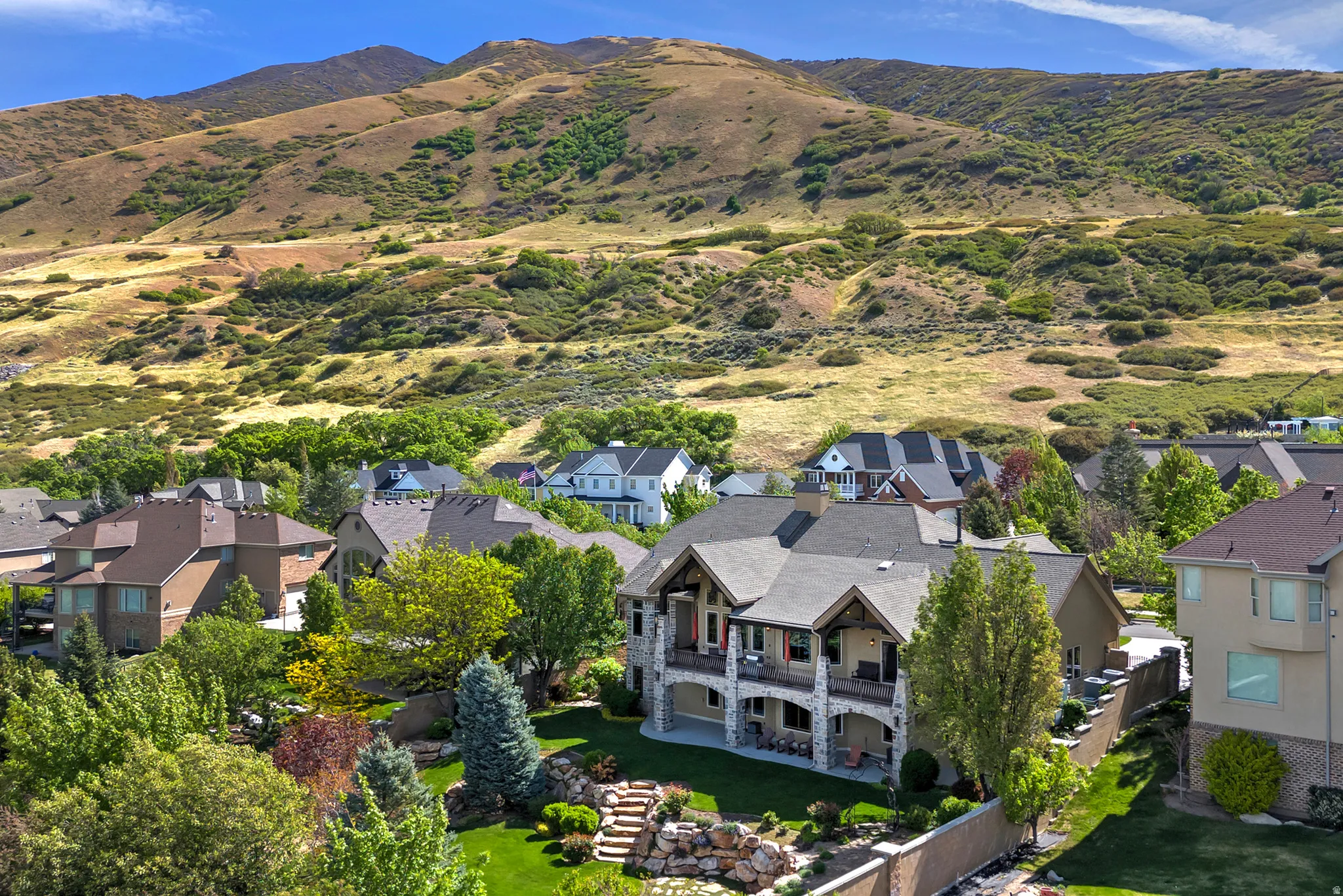 Aerial view of residential area with a mountain backdrop