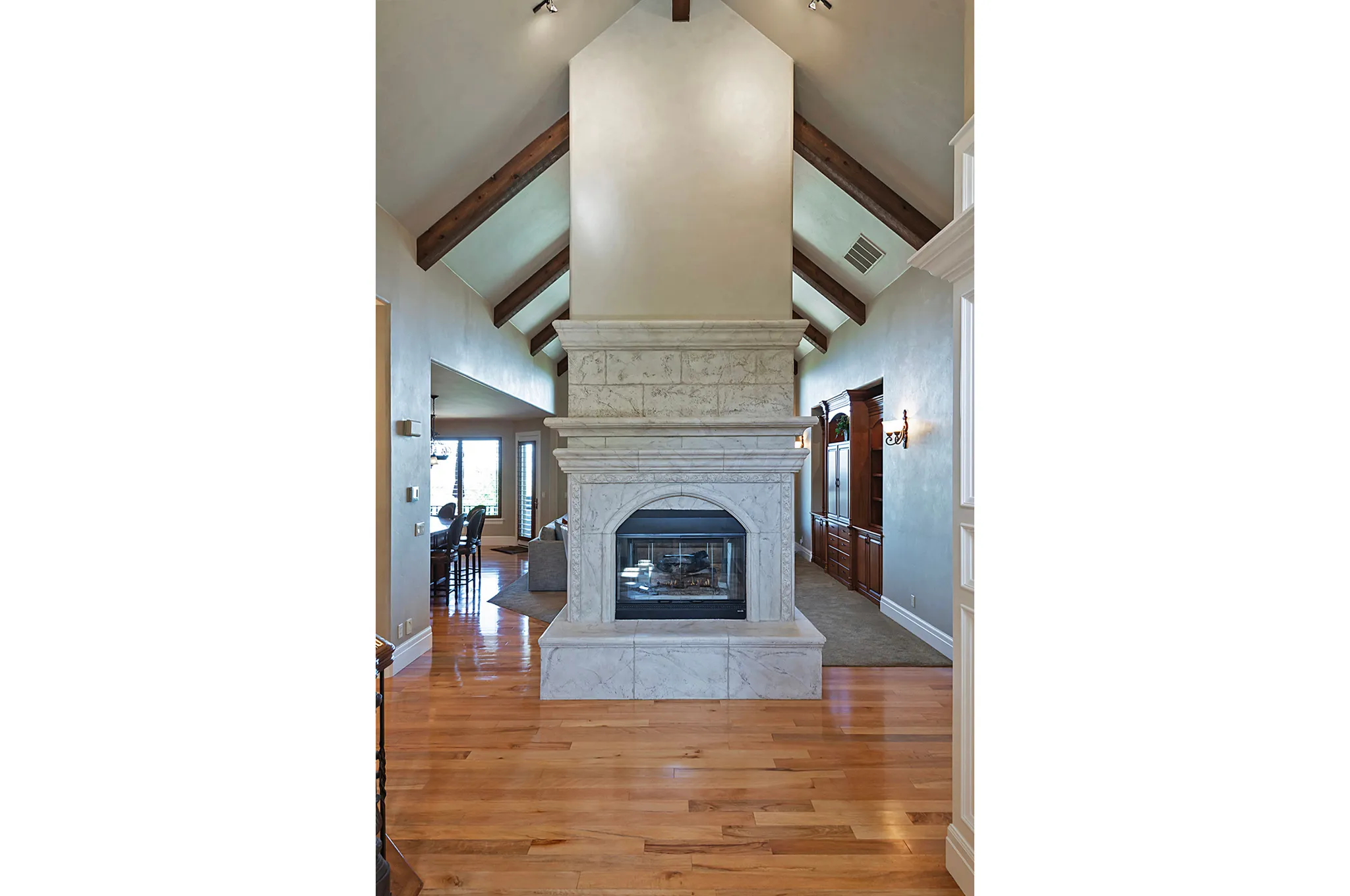 Unfurnished living room with light wood-style floors and a fireplace