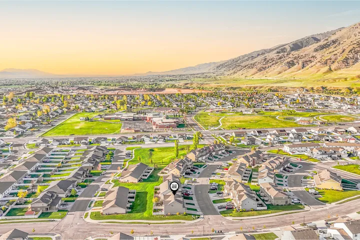 Aerial view at dusk of a mountain view and a residential view