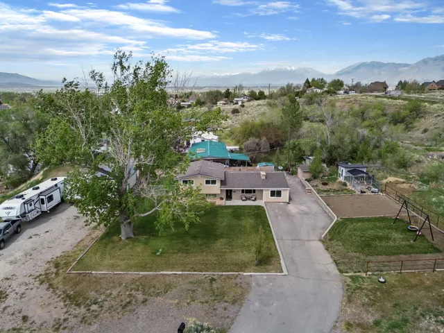 View of subject property with a mountain backdrop