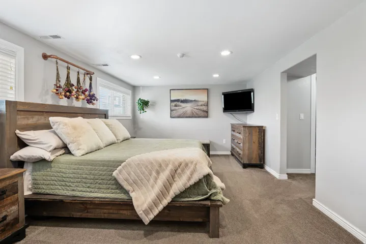 Bedroom with carpet and recessed lighting